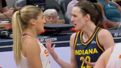 Caitlin Clark talking to Jacy Sheldon