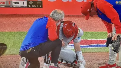 JT Realmuto hunched over in pain