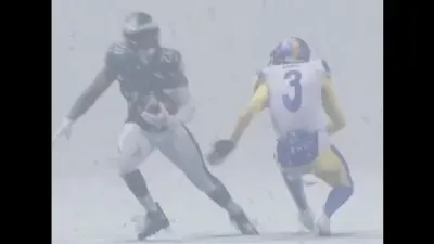Eagles' Saquon Barkley running past Rams' Kam Curl in Madden 26 trailer