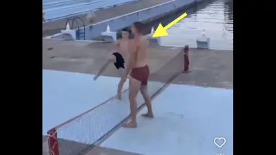 Nikola Jokic wearing swimming trunks