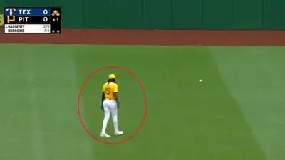 Oneil Cruz looks at a ball