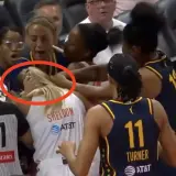 Sophie Cunningham grabbing Jacy Sheldon during Fever-Sun game