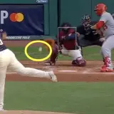 Luis Ortiz delivers a wild pitch