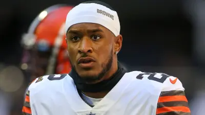 Grant Delpit looks on