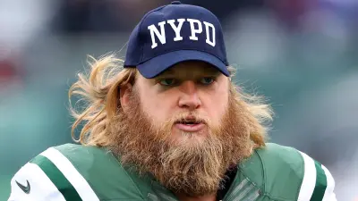 Nick Mangold looks on