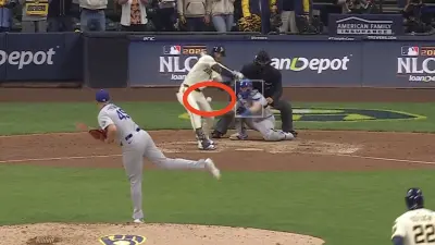 Brice Turang avoiding a hit-by-pitch during final at-bat of Dodgers-Brewers NLCS Game 1