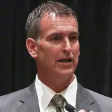Mack Rhoades at a news conference