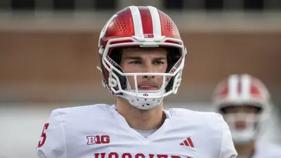 Fernando Mendoza warming up for a game