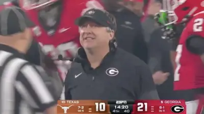 Kirby Smart smiling after Georgia recovered an onside kick against Texas