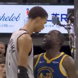 Victor Wembanyama staring down Draymond Green during a Warriors-Spurs game